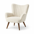 Fauteuil en bouclé avec pieds en bois de chêne