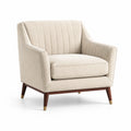 Fauteuil en tissu lin beige avec pieds en bois et accents dorés