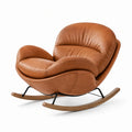 Fauteuil à bascule en cuir marron avec structure en bois et métal