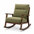 Fauteuil à bascule en bois avec textile rembourré vert